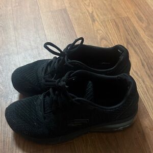 Skechers women’s  Black Knit Sneakers